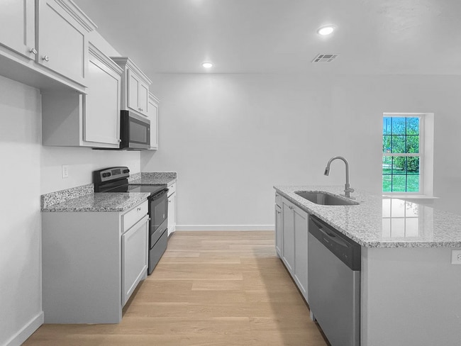 Building Photo - Be the First to Live in this Charming 2-Be...