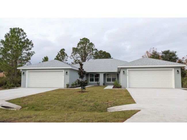 Building Photo - 4 bedroom/2 bath/ 2 car garage Duplex.    ...