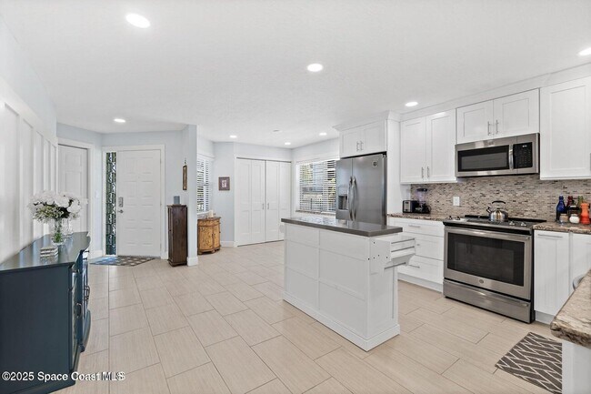 Building Photo - 3609 S Banana River Blvd