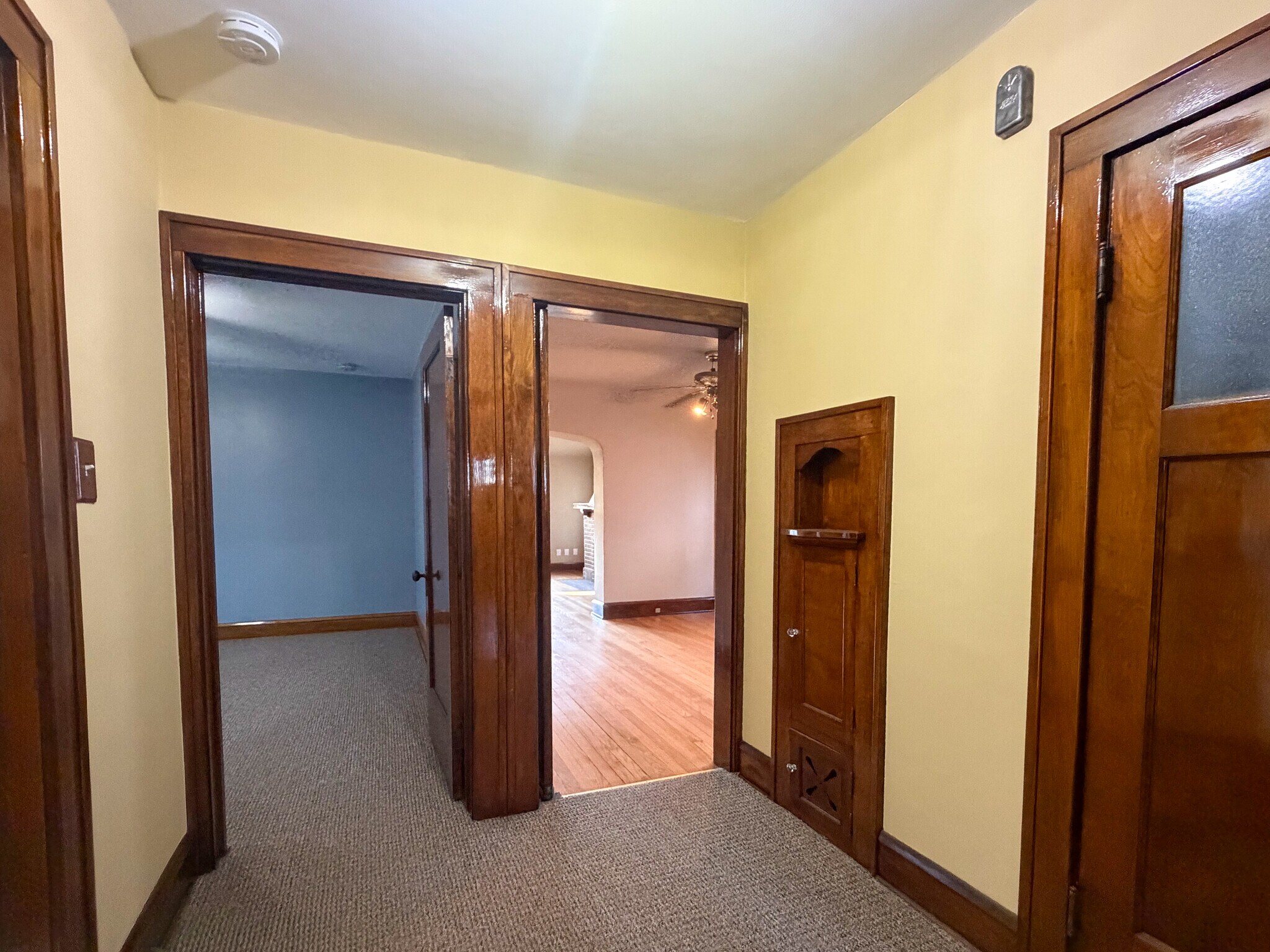 Foyer between kitchen, bath, bedrooms and side door - 5411 W National Ave