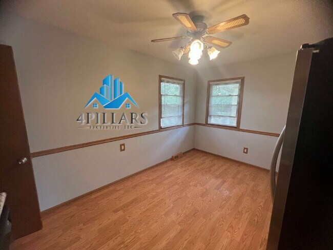Building Photo - "Charming 3-Bedroom Haven with Finished Basement & Gleaming Hardwood Floors in Hammond!"