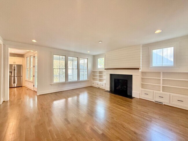 Building Photo - Custom Built 4BD, 3.5BA Five Points Home with a Bonus Room & Fenced Yard