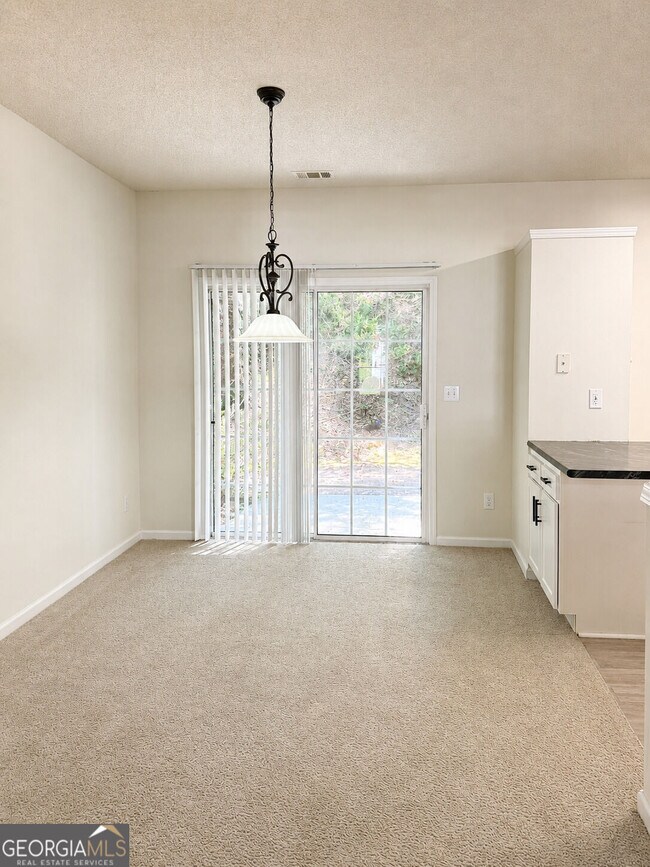Building Photo - 9155 Nesbit Ferry Rd