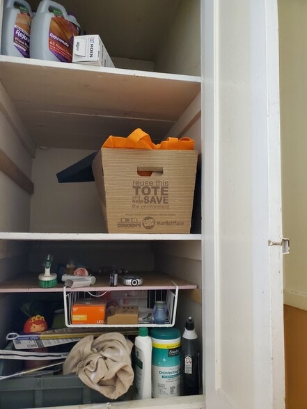 cupboards above toilet - 606 7th St N