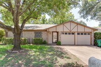 Building Photo - No Carpet! Great tree shaded yard!