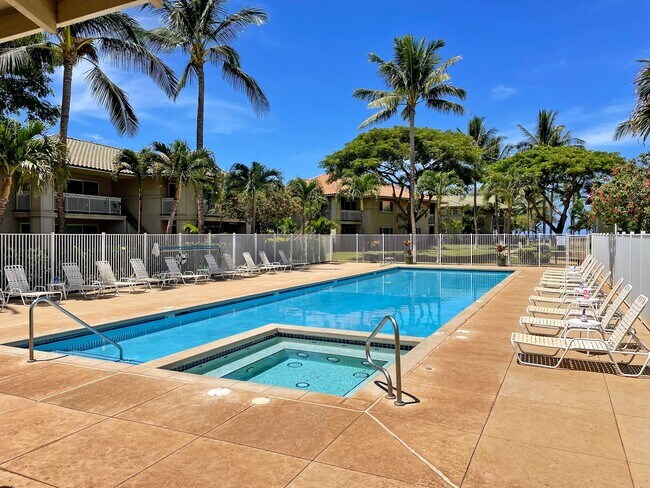Building Photo - Beach Style 2 bed/2bath Luxury Condo - Finely Furnished - Steps from the Beach - Resort Amenities -