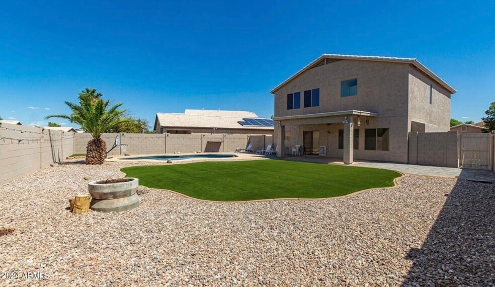 Huge turfed backyard with pool - 66 E Saddle Way