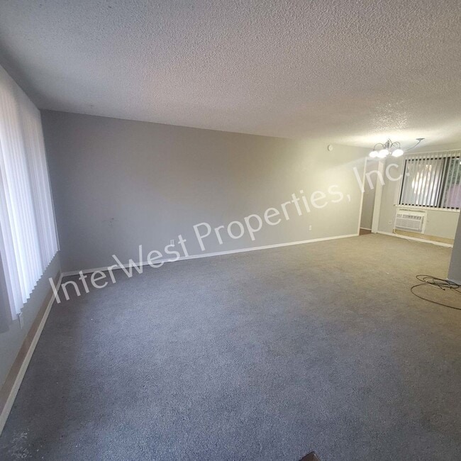 Building Photo - Beautiful Ranch Style Home on Very Large Corner Lot With W/D Hookups, Fireplace, 2 Car Garage & A...