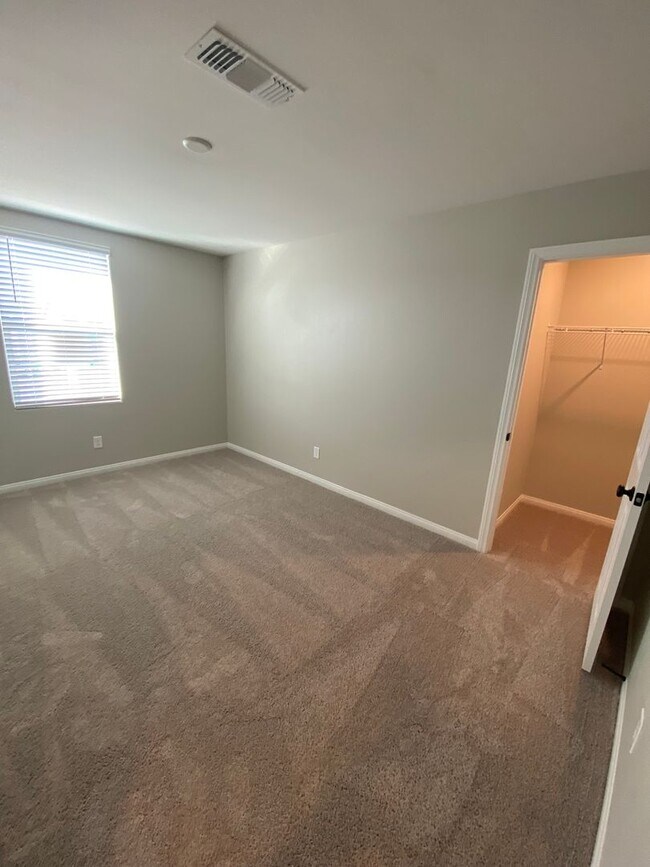 Building Photo - Americana Property Mgmt - 2022 built 4 bedrooms in prime South West Las Vegas