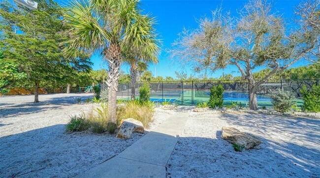 Building Photo - 7665 Sanderling Rd