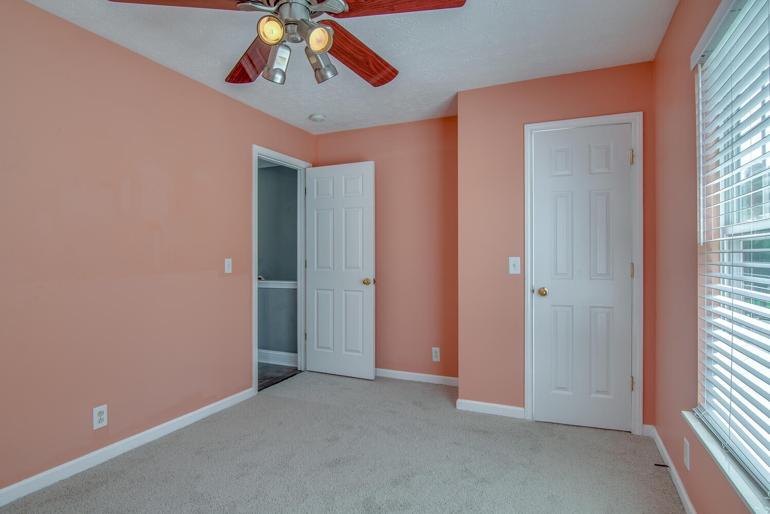 This guest bedroom has been updated with Agreeable Gray paint since this picture was taken. - 7109 Commonwealth Cir