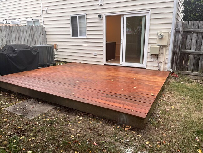 Newly power washed and stained deck (2025) - 9908 Whitney Cir