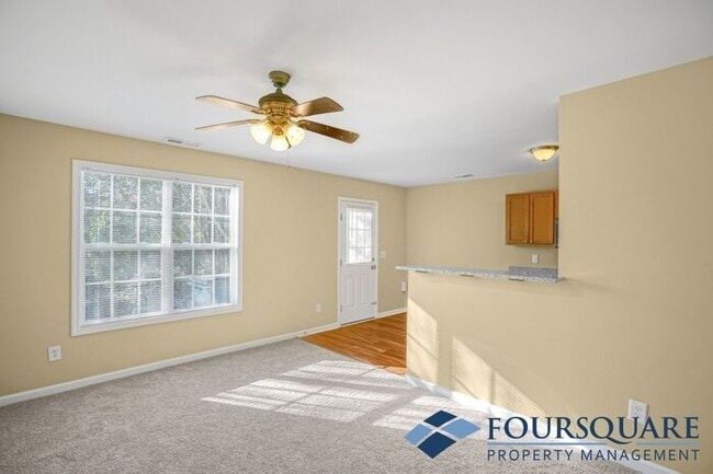 Building Photo - Charming 3-Bedroom Townhome with First-Floor Suite & Off-Street Parking – Near Capital Blvd & I-440