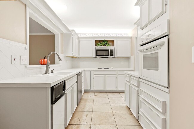 White kitchen - 2857 E 84th St