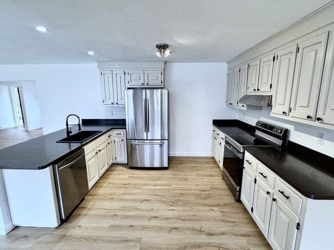 Building Photo - READY NOW!! 4-Bedroom Home in Lake Trant w/Attached Garage! Pet Friendly!