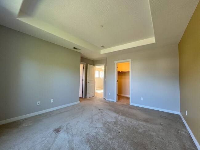 Building Photo - Modern 4-Bedroom Home on Large Corner Lot ...