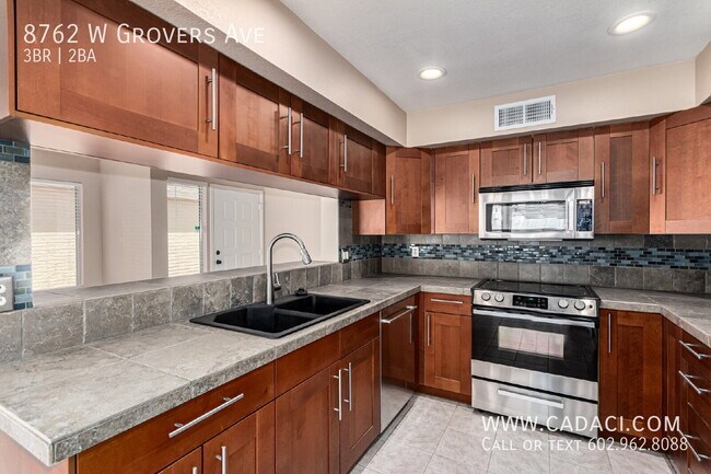 Building Photo - 8762 W Grovers Ave