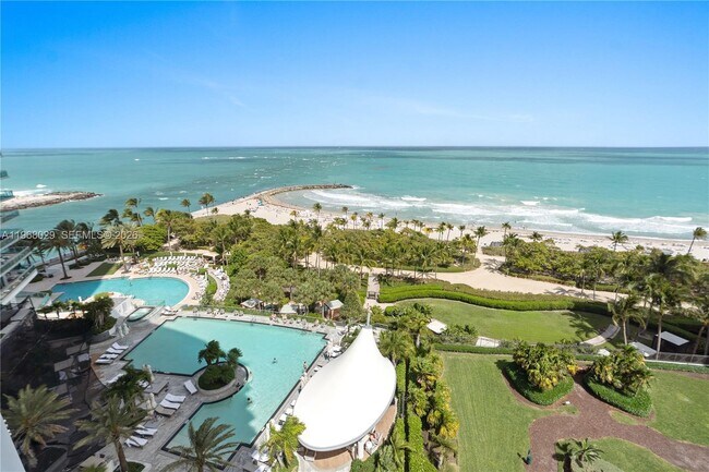 Building Photo - 10295 Collins Ave