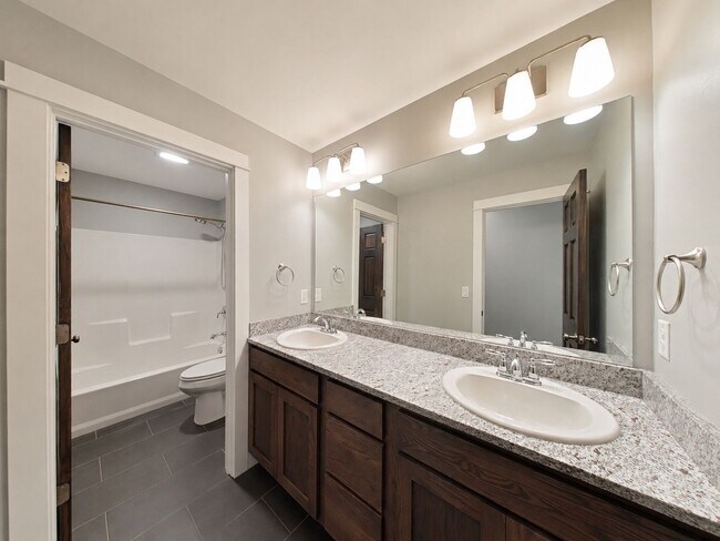 Building Photo - Stunning 3-bedroom, 2.5-bathroom condo with attached 2 stall garage!