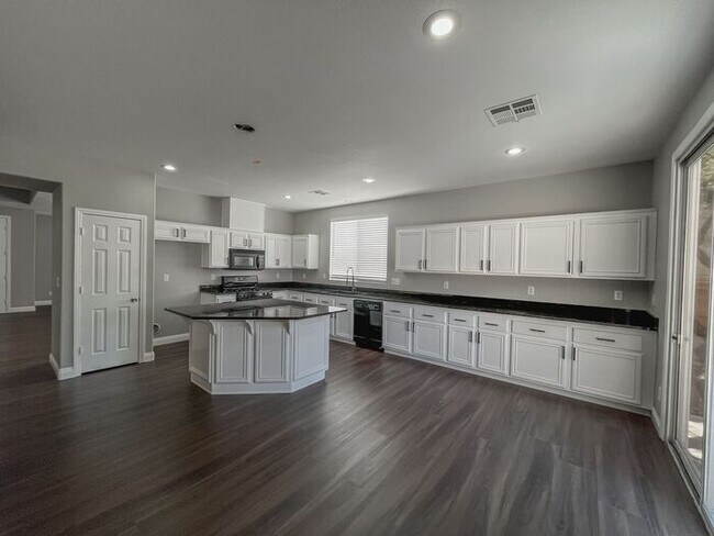 Building Photo - Stunning 5-Bedroom Home in Gated Community...