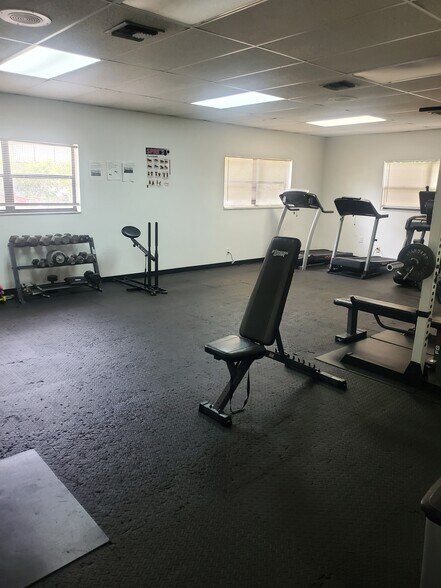 Fitness room in clubhouse - 6700 Cypress Rd