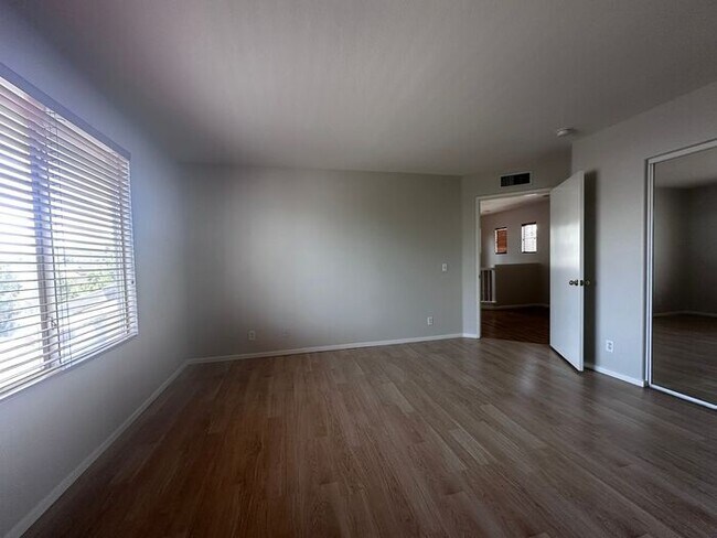 Building Photo - Nestled in a Quiet  Peaceful Valencia Community is ...