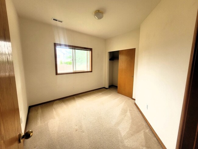 Building Photo - Charming Split-level 4 Bedroom Home - E Mc...
