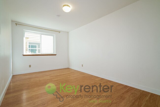 Building Photo - Remodeled Two-Bedroom with Open Floor Plan...