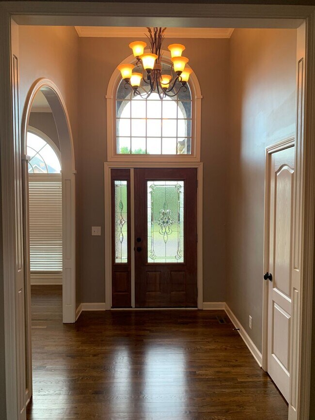 Building Photo - Luxury Living! Beautiful Brick Home in Sango with 3 car garage.