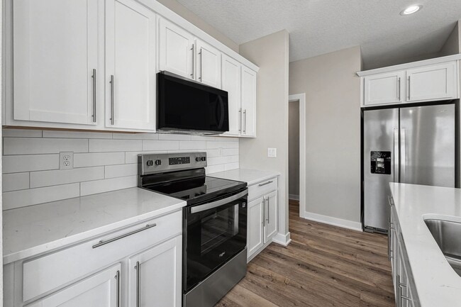 Building Photo - Luxury New Construction Townhome with Attached 2 Car Garage!