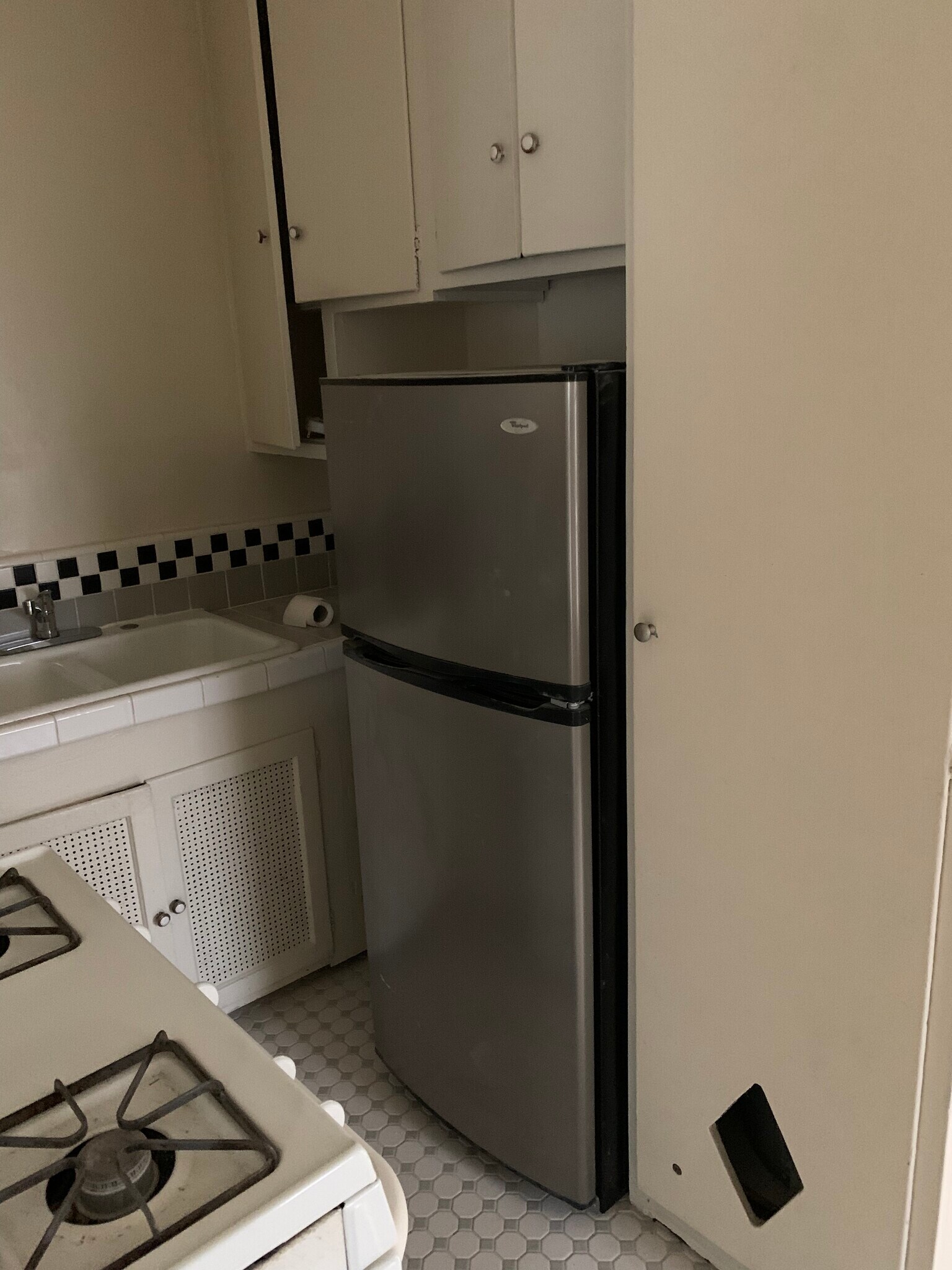 Kitchen with Stove and Refrigerator With Custom Tile Floors - 824 1/2 S Curson Ave