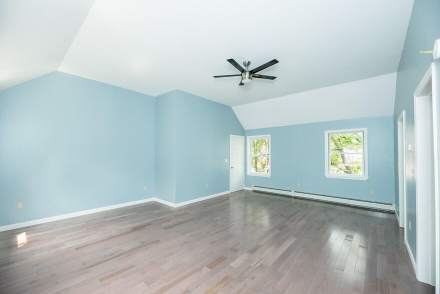 Master bedroom, walk-in closet attached (not pictured) - 79 Main St