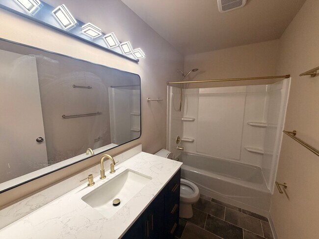 Building Photo - A beautiful and spacious (4) Bedroom home has what you need!