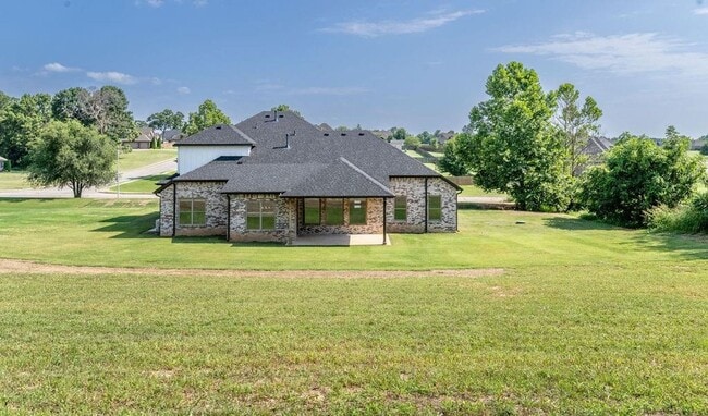 Building Photo - 5 bedroom CUSTOM BUILT home in Elm Springs MUST SEE