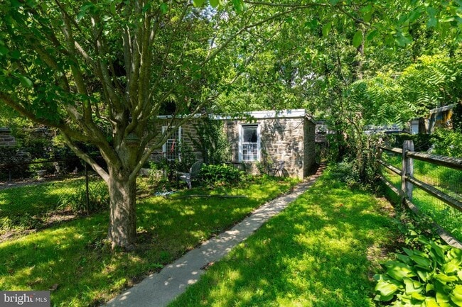 Building Photo - Welcome to this sunny and updated 4-bedroom, 2-bath row home in the heart of Mt. Airy! W/D! Large...