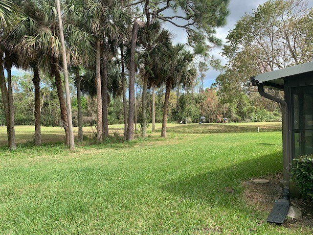 Building Photo - Stunning Pelican Bay Townhome