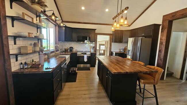 Building Photo - Newly remodeled fully furnished house country living outside of Ronan! Available September 26th -...