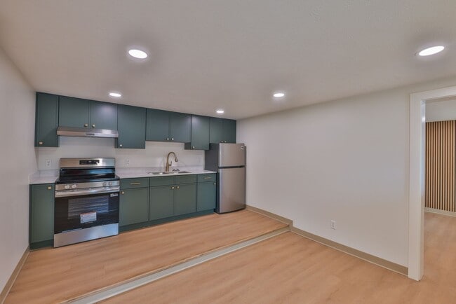 Building Photo - Modern Remodel with Designer Finishes | All Utilities Included