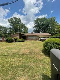 Building Photo - 2 bedroom 3 bath  Mid- Century style home!...