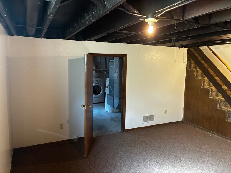 This shows the entrance to the unfinished part of the basement - 1205 Randolph St