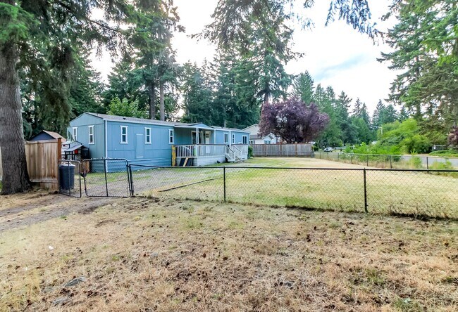 Building Photo - Updated 2 bedroom manufactured home on large corner lot