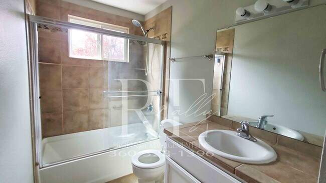 Building Photo - Modern Manette 1BR Condo with Private Pati...