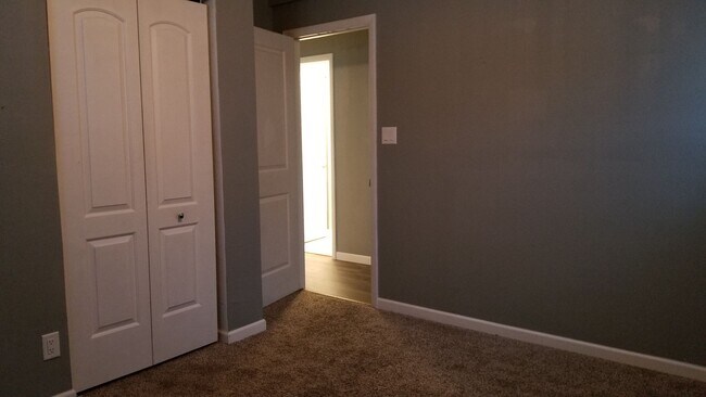 Building Photo - NE 3 bedroom updated with appliances and garage