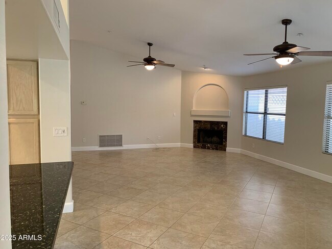 Building Photo - 8889 E Aster Dr