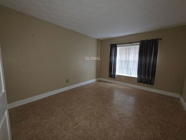 Building Photo - Lakefront First-Floor Condo in Camelot by ...