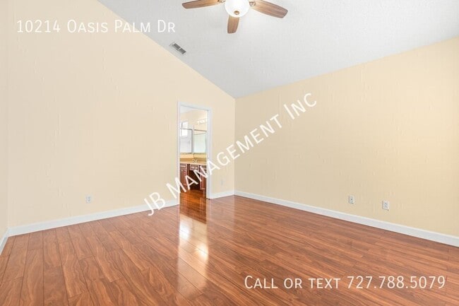 Building Photo - 10214 Oasis Palm Dr
