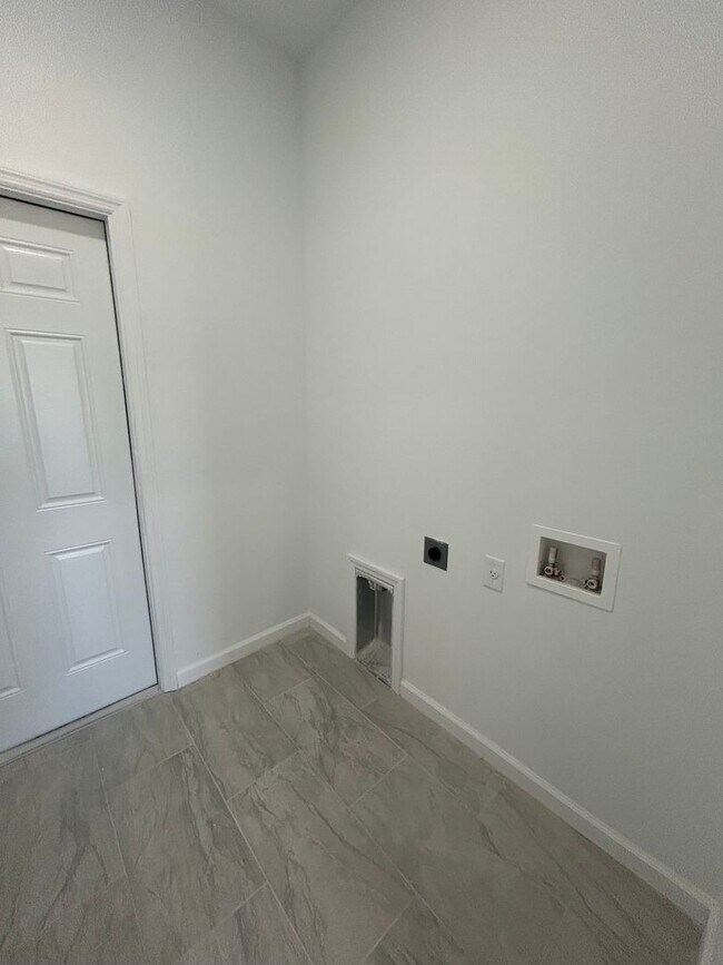 Building Photo - JUST BUILT! Spacious 4/2/2 Home -Perfect for Your Family in SW Lehigh Acres