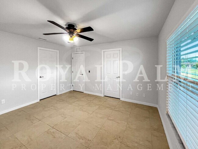 Building Photo - Stop and Smell the Roses – Updated 3BR/2BA Single Family Home with a Yard That’s Ready to Bloom