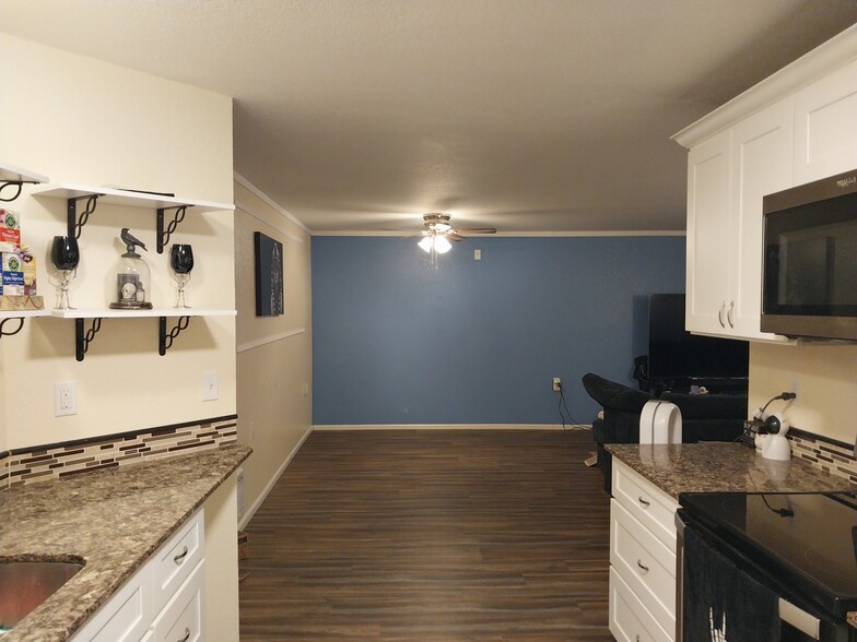 Living area (from kitchen) - 9815 Holly Dr