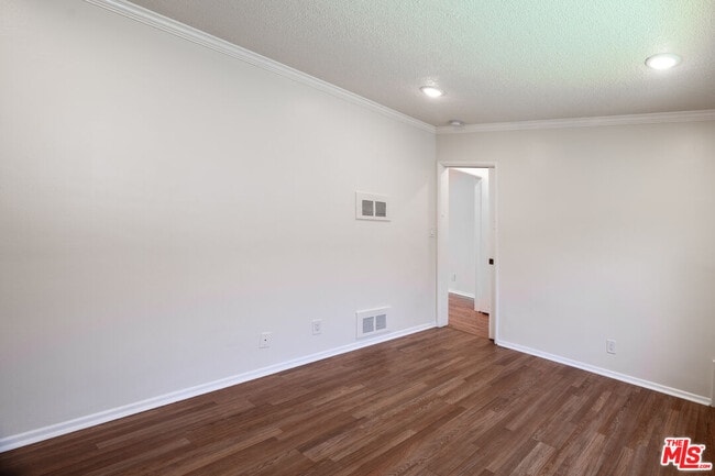 Building Photo - 7209 Willoughby Ave